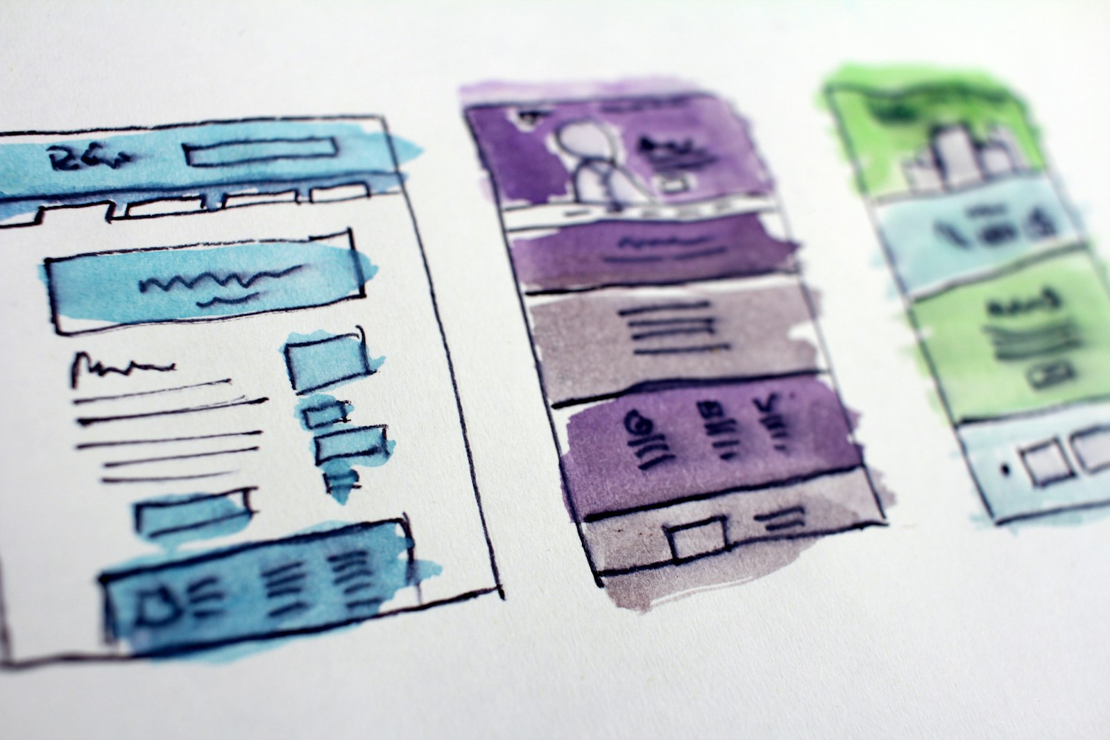 Hand-drawn website wireframe sketches for a redesign project